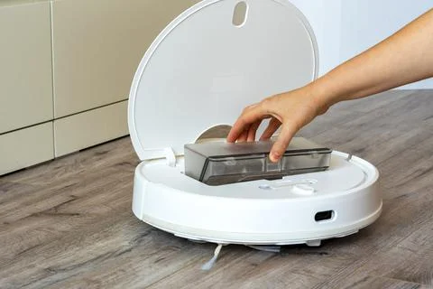 Robot cleaner.Garbage container Stock Photos