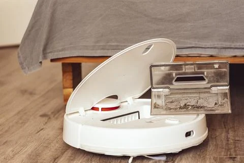 Robot cleaner.Garbage container Stock Photos