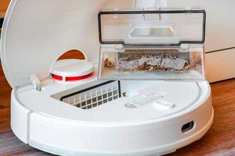 Robot cleaner.Garbage container Stock Photos