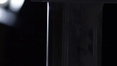 The robot in the company with the help of a program written to work with steel Stock Footage 86187196