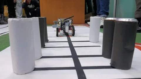 The robot at the competition chooses the road Stock Footage 85552470