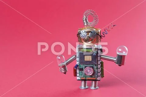 Robot concept retro style. Circuits socket chip toy mechanism, funny head, eyes Stock Photos