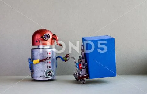 Robot courier moving big blue container with powered pallet jack. Forklift cart Stock Photos