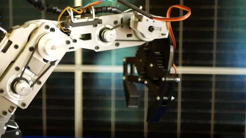 The robot crab clamp moves in space according to the program Stock Footage 305394090