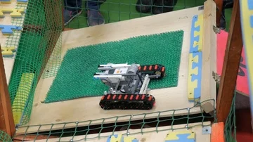 Robot crawler drive to overcome obstacles on the competition Stock Footage 85716769