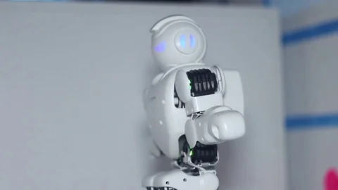 Robot crouches Stock Footage 81789405