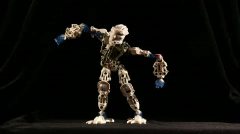 Robot dance on black background. Time lapse. Stock Footage 545507
