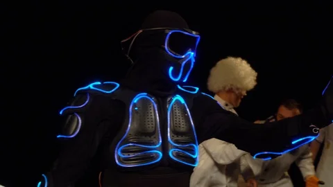 Robot dancer in a neon suit. 4k Stock Footage 98210160