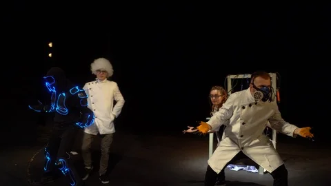 The robot is dancing with a scientist Stock Footage 98210939