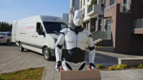Robot delivering parcel box to recipient, walking along the street with trolley Stock Footage 166175861
