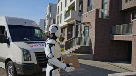 Robot delivering parcel box to recipient, walking along the street carring Stock Footage 166176153