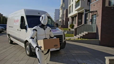 Robot delivering parcel box to recipient, walking along the street carring Stock Footage 166176206