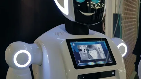 A robot with a display shows emotions, talking. Modern technology. Stock Footage 83445349