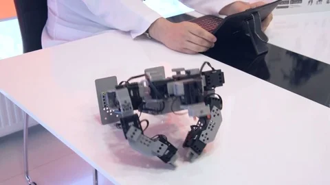 Robot does push-ups Stock Footage 77264139