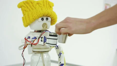Robot drinks alcohol Stock Footage 87250221