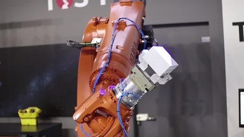 Robot engineer works with microplates in the factory. Stock Footage 115028839