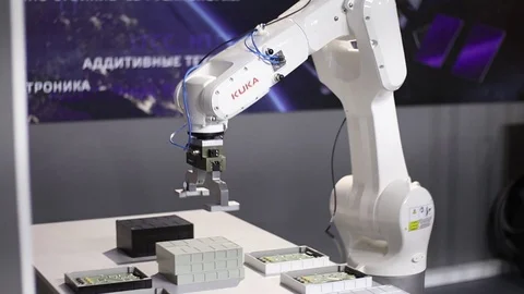 Robot engineer works with microplates Stock Footage 115028838