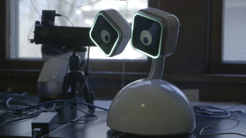 Robot expressing feelings through digital eyes and motion Stock Footage 147359918