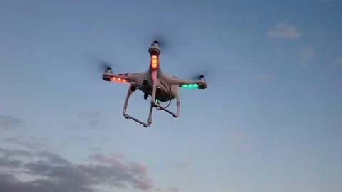 The robot flies over the ground Stock Footage 84271820