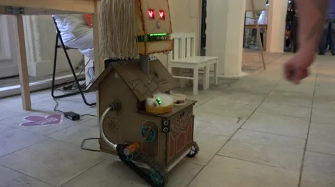 Robot grinder asks for money for their music. New technologies. Stock Footage 52362354
