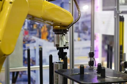 Robot hand machine in industrial that is working. Stock Photos