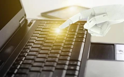 Robot hand use laptop computer, Artificial Intelligence Technology Concept. Stock-Fotos