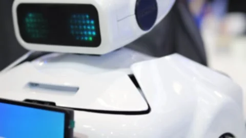 Robot head with blue eye-like lights Stock Footage 345682503