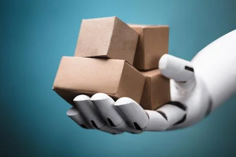 Robot Holding Cardboard Boxes Stock Photos