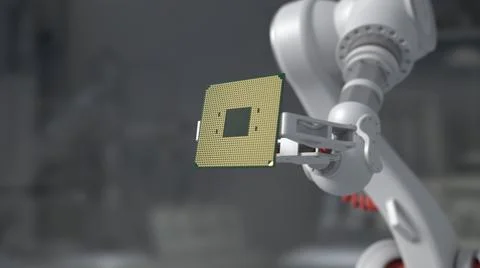 The robot holds a productive processor for a personal computer. Blurry gray b 写真素材