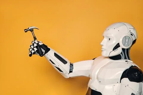 Robot isolated on orange background Stock Photos