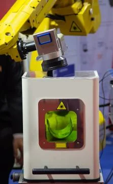 Robot laser cleaning machine Stock Photos