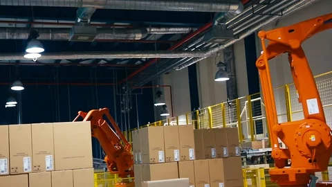 A robot lifting Packing with products Stock Footage 74284485