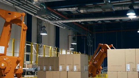 A robot lifting Packing with products Stock Footage 88542315