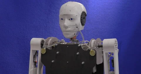 Robot looking around and waving hand Stock Footage 67390377