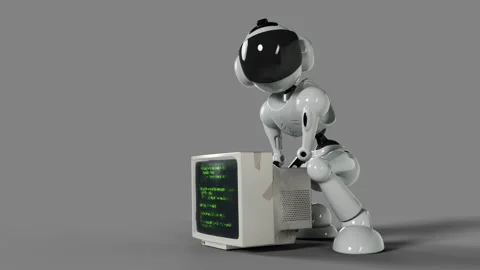 The robot is looking for useful components in an old PS computer Video stock 254469330