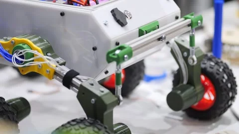 Robot with mechanical joints and wheels in lab Stock Footage 345682169