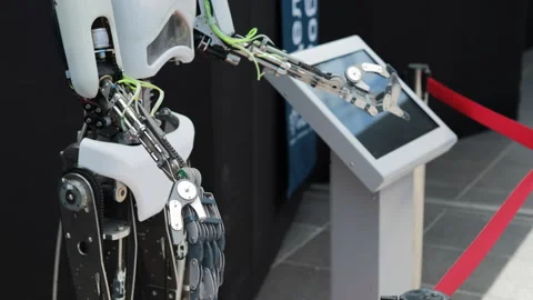 Robot moving its fingers and hands at exhibition Stock Footage 315216726