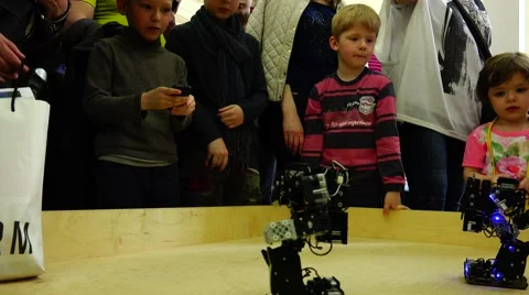 Robot. New technologies.  AI. Children playing with robots. Stock Footage 50228034