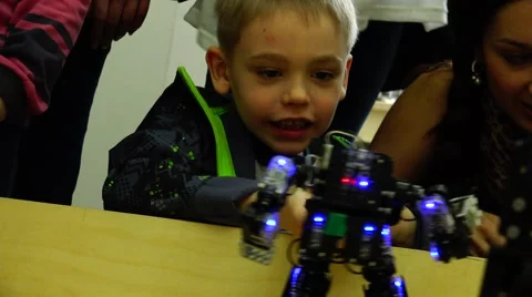 Robot. New technologies.  AI. Children playing with robots. Stock Footage 50228070
