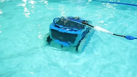 Robot pool cleaner. Pool maintenance with automatic robot. 스톡 동영상 241745113