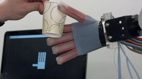 Robot pouring water into the cup Stock Footage 93520501