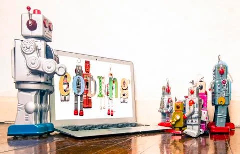 Robot presentation  with laptop Stock Photos