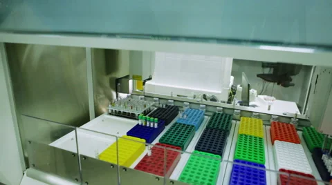 Robot Puts Medical Samples on the Conveyor. Line, Chemistry, Automated, Video stock 60994306