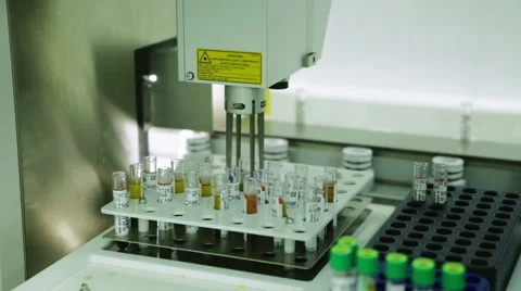 Robot Puts Medical Samples on the Conveyor Line. Chemistry, Automated, Stock Footage 61006623