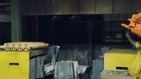 Robot is putting form for car engine in a automobile factory Stock Footage 75165221