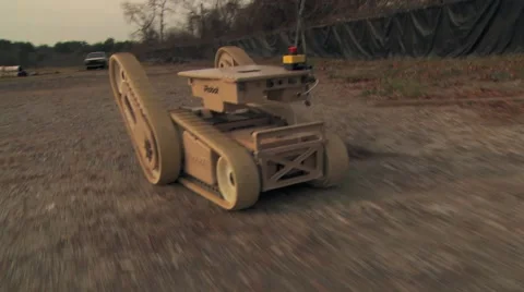 Robot rolling on ground Stock Footage 66358764