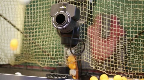Robot for serving of tennis balls turns and shooting balls Video stock 61772007