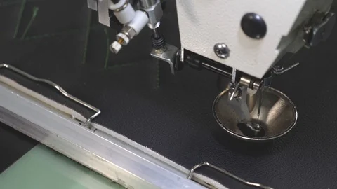 Robot sewing machine. computer controls the sewing machine. automatic sewing Stock Footage 108371244