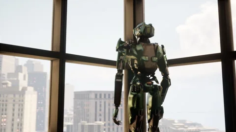 Robot in a spacious office with panoramic windows, looking out the window at the Stock Footage 254481424