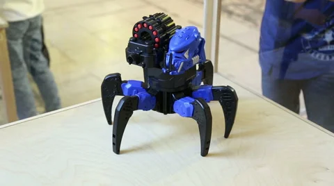 Robot spider shoots bullets Stock Footage 55385775